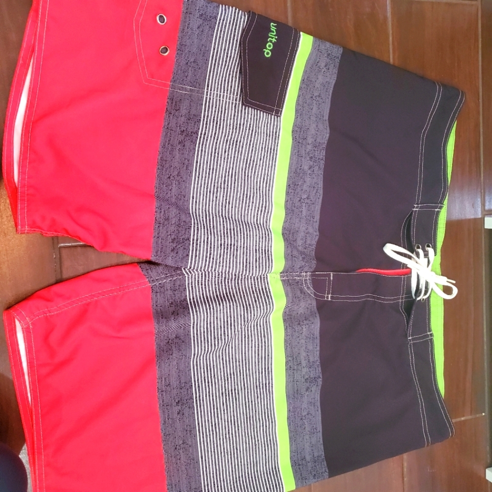 Mens unitop swimming shorts size 38 in black green and red
